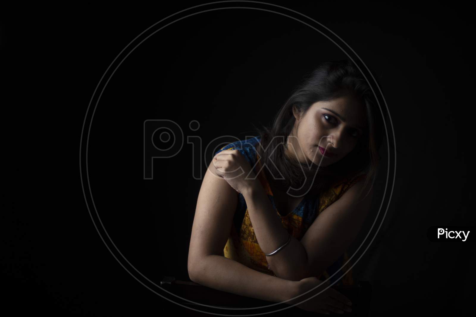 Fashion portrait of an young Indian Bengali brunette woman in