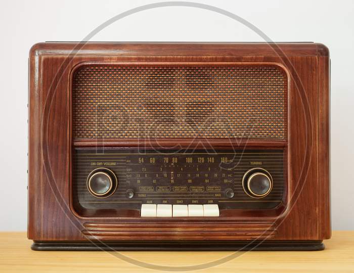 Vintage radio made of wood on a table