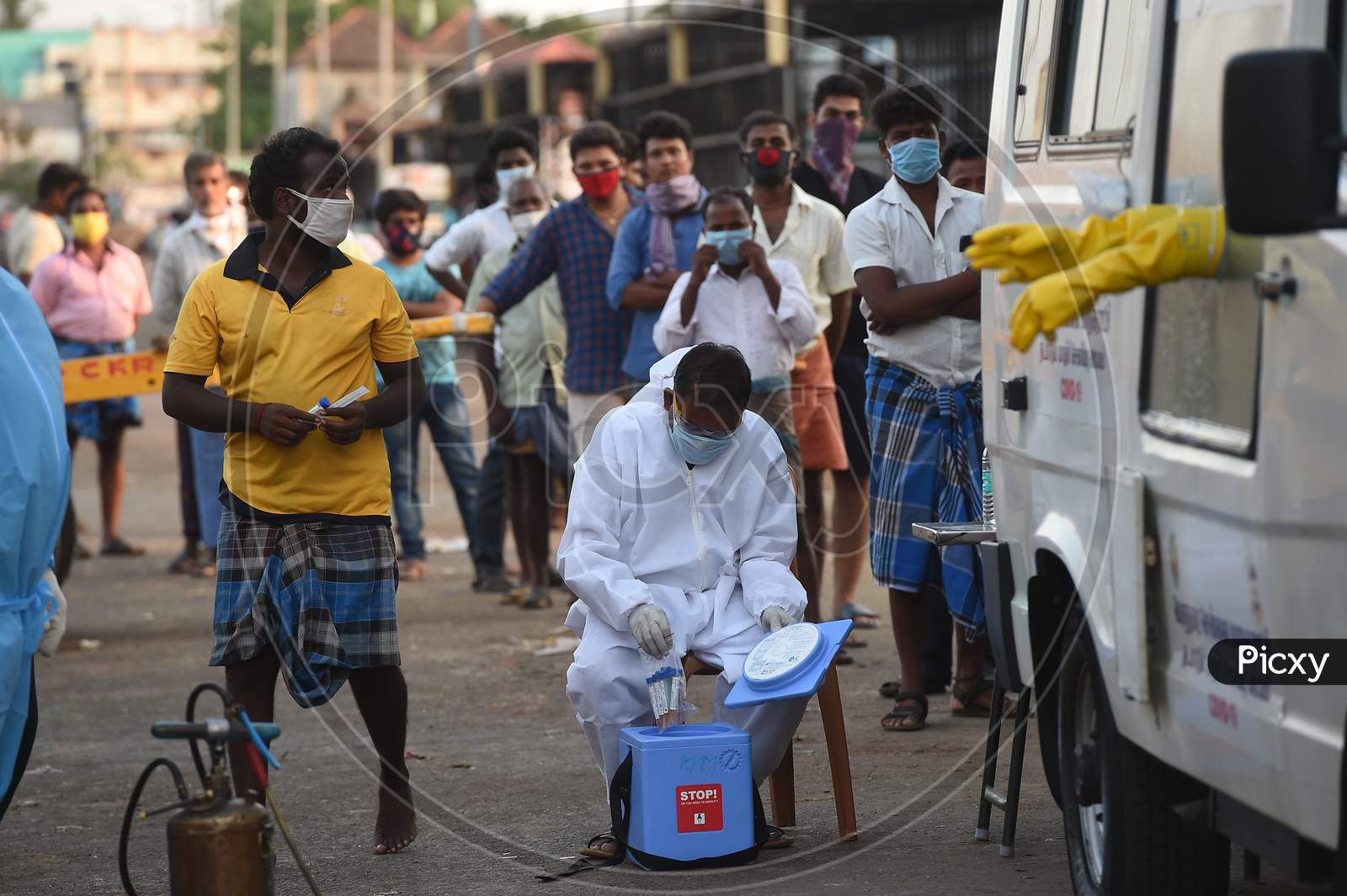 edics Wearing Protective Suits Collect Swab Samples For Labourers Of Koyambedu Vegetable Market During A Government-Imposed Nationwide Lockdown As A Preventive Measure Against The Spread Of Covid-19 Or Coronavirus, In Chennai
