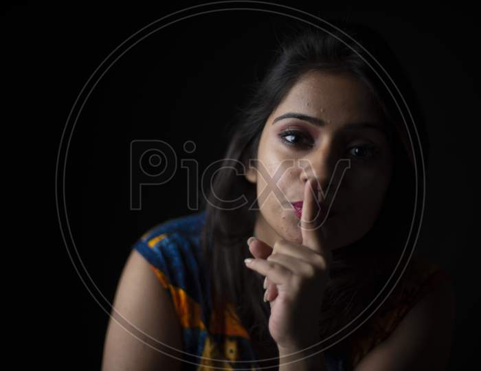 Fashion portrait of an young Indian Bengali brunette woman in