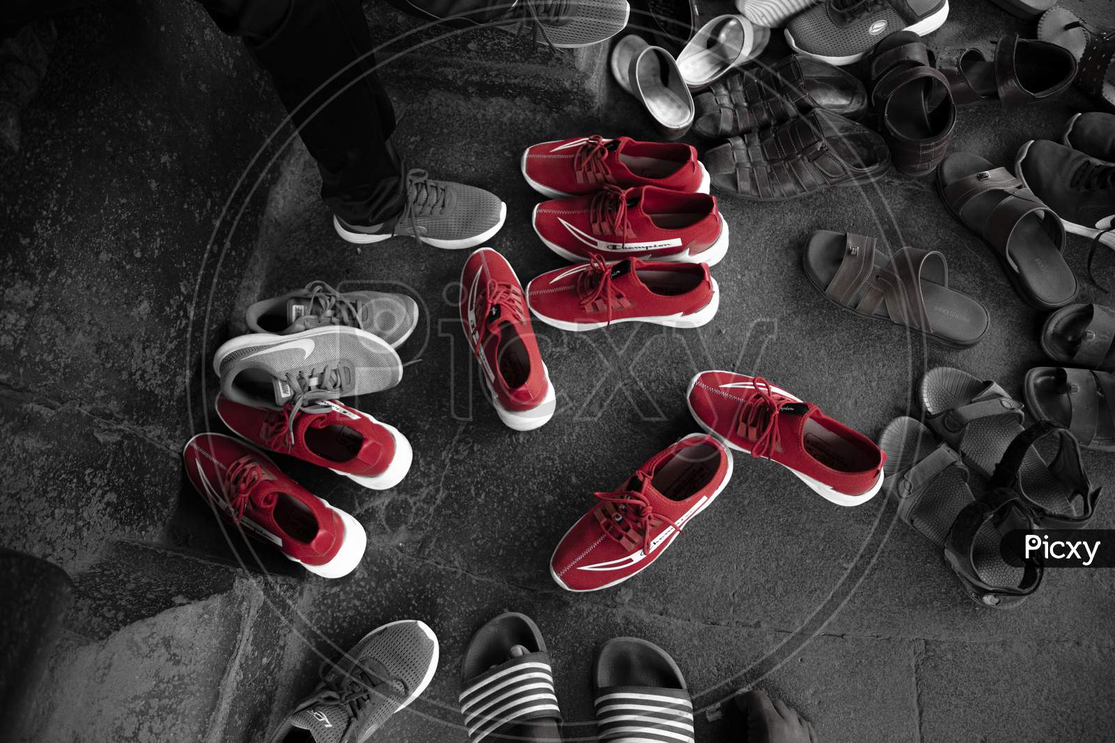 A group of red shoes in entrance of temple.