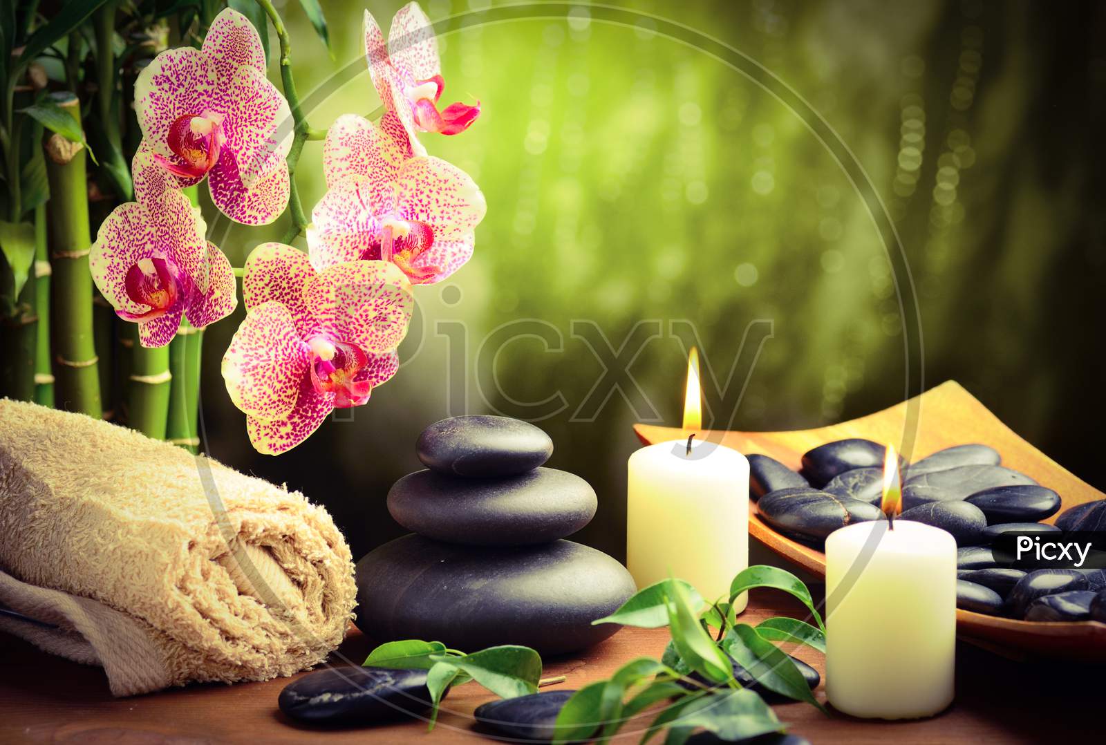 Black stone with candles for spa background