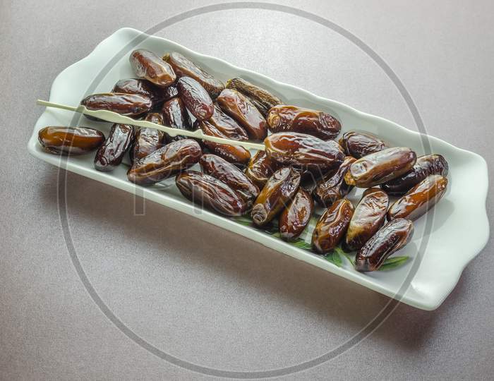 A tray of dates from the shop ready for eating.