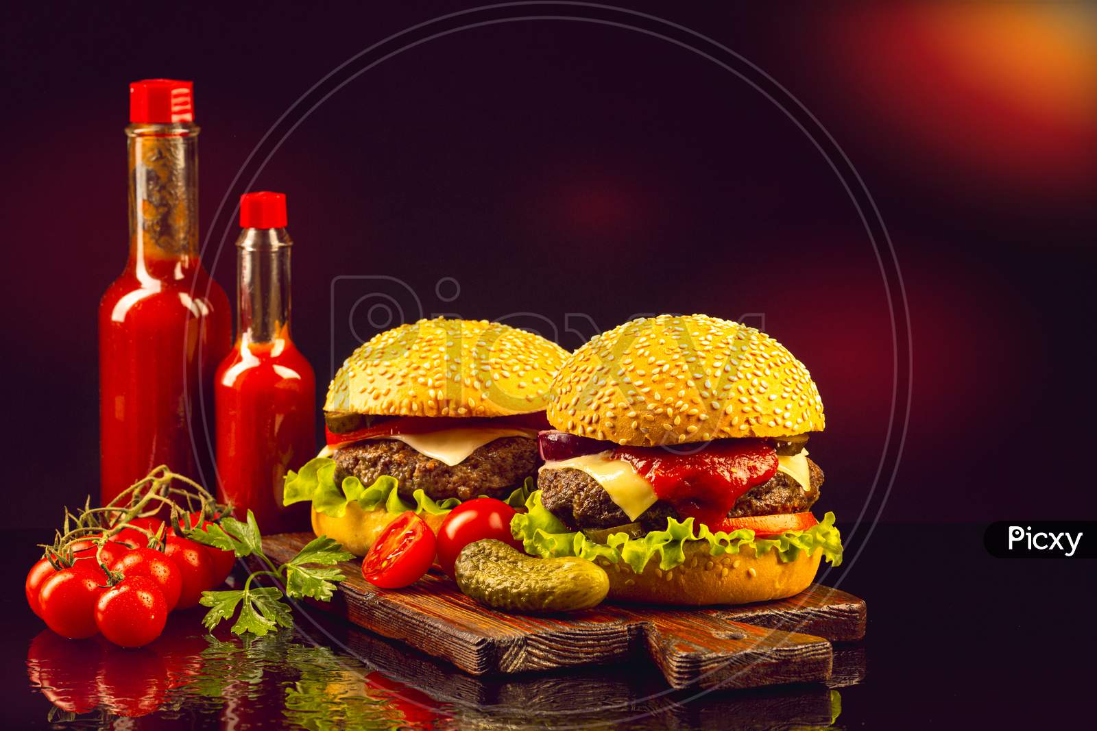 hamburger and french fries with ketchup