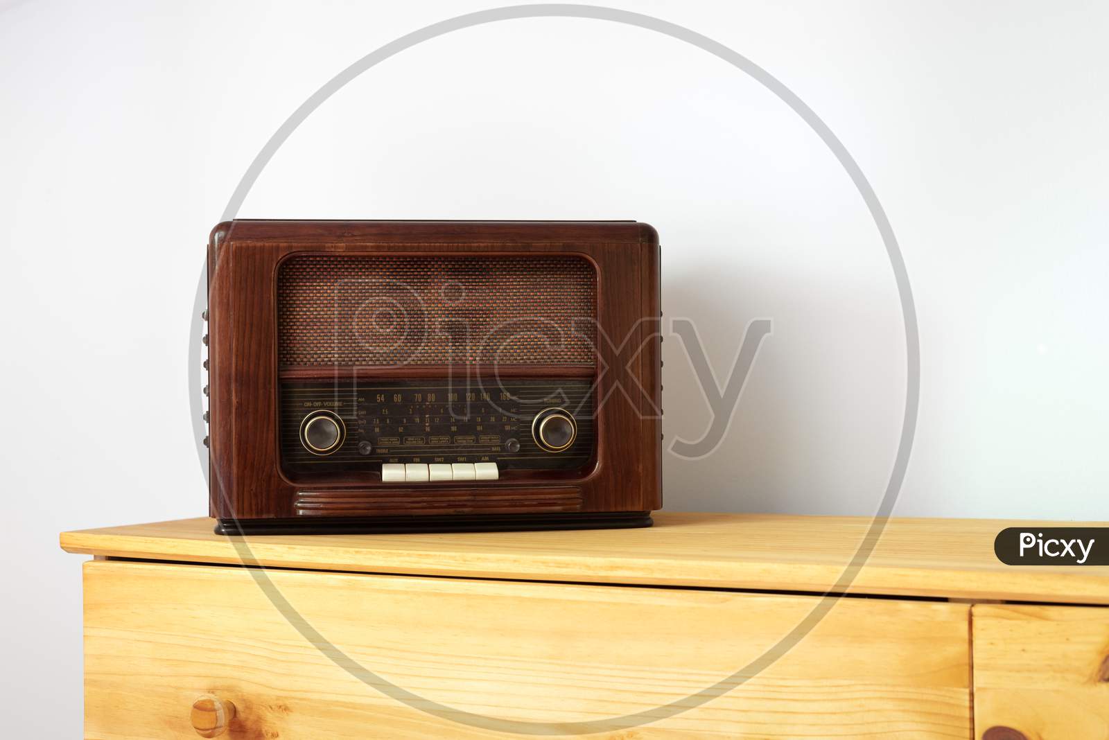 Vintage radio made of wood on a table