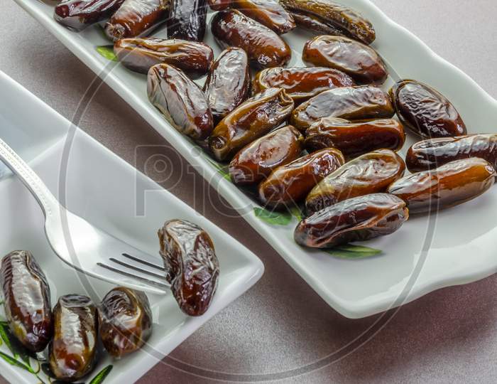 A tray of dates from the shop ready for eating.