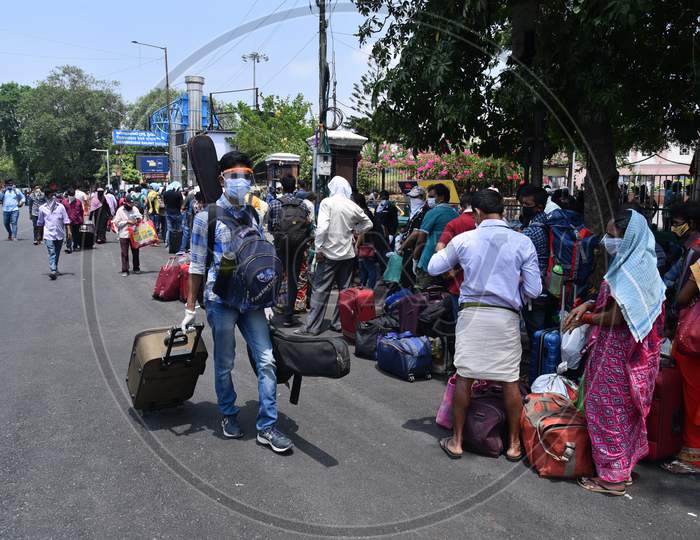 Migrants and Stranded passengers wait outside Secunderabad Railway Station to board trains as Indian Railways resume transport services as government eases restrictions for the ongoing nationwide lockdown amid coronavirus pandemic. June 1, 2020, Hyderabad.
