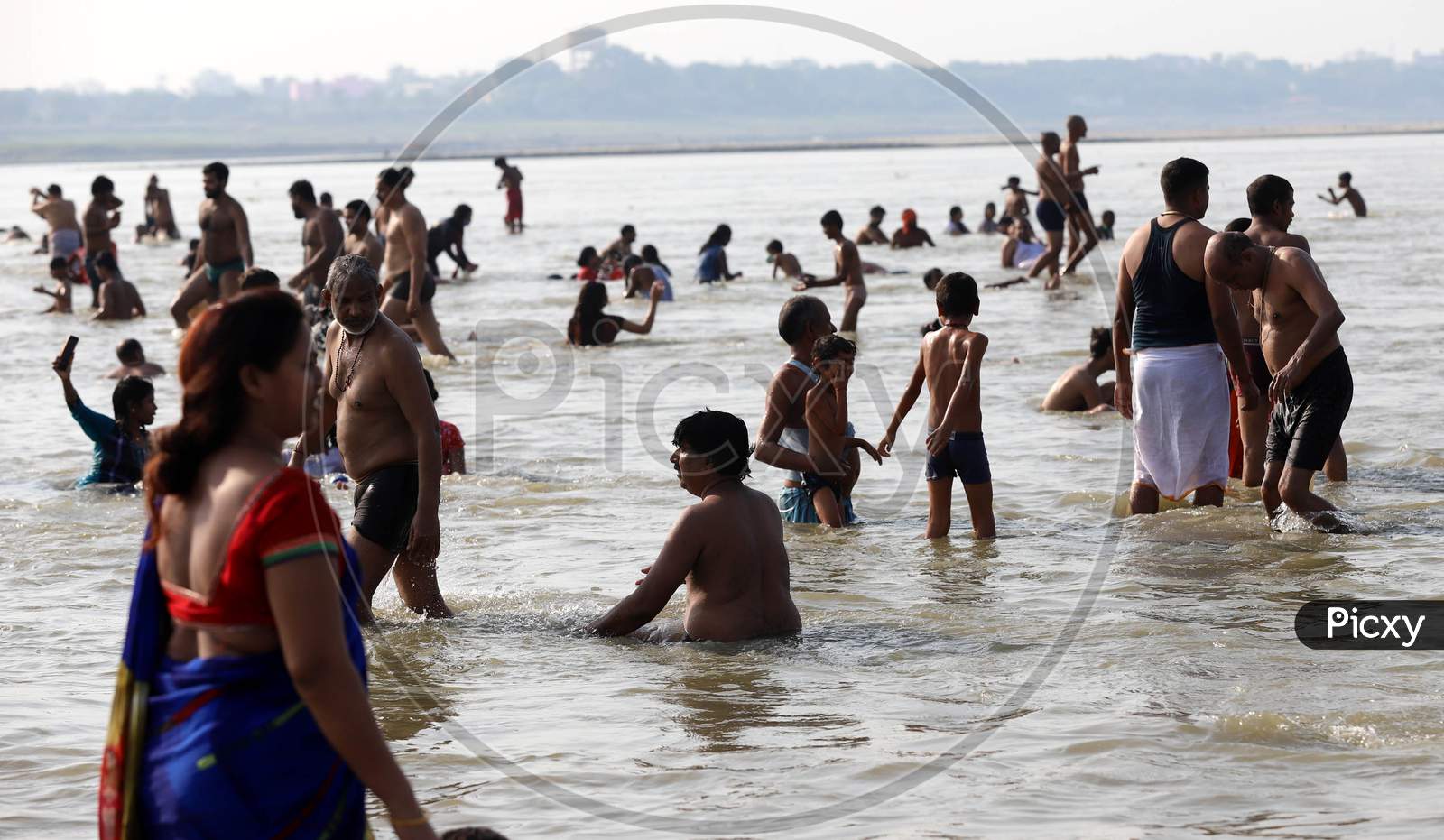 Hindu Devotees Taking Holy Dip in Triveni Sangam Of Three Rivers, The Ganga, The Yamuna And Mythical Saraswati On The Occasion Of Ganga Dusshera Festival In Prayagraj, June 1, 2020.