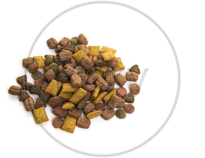 Heap Of Colorful Dry Cat Food On A White Background