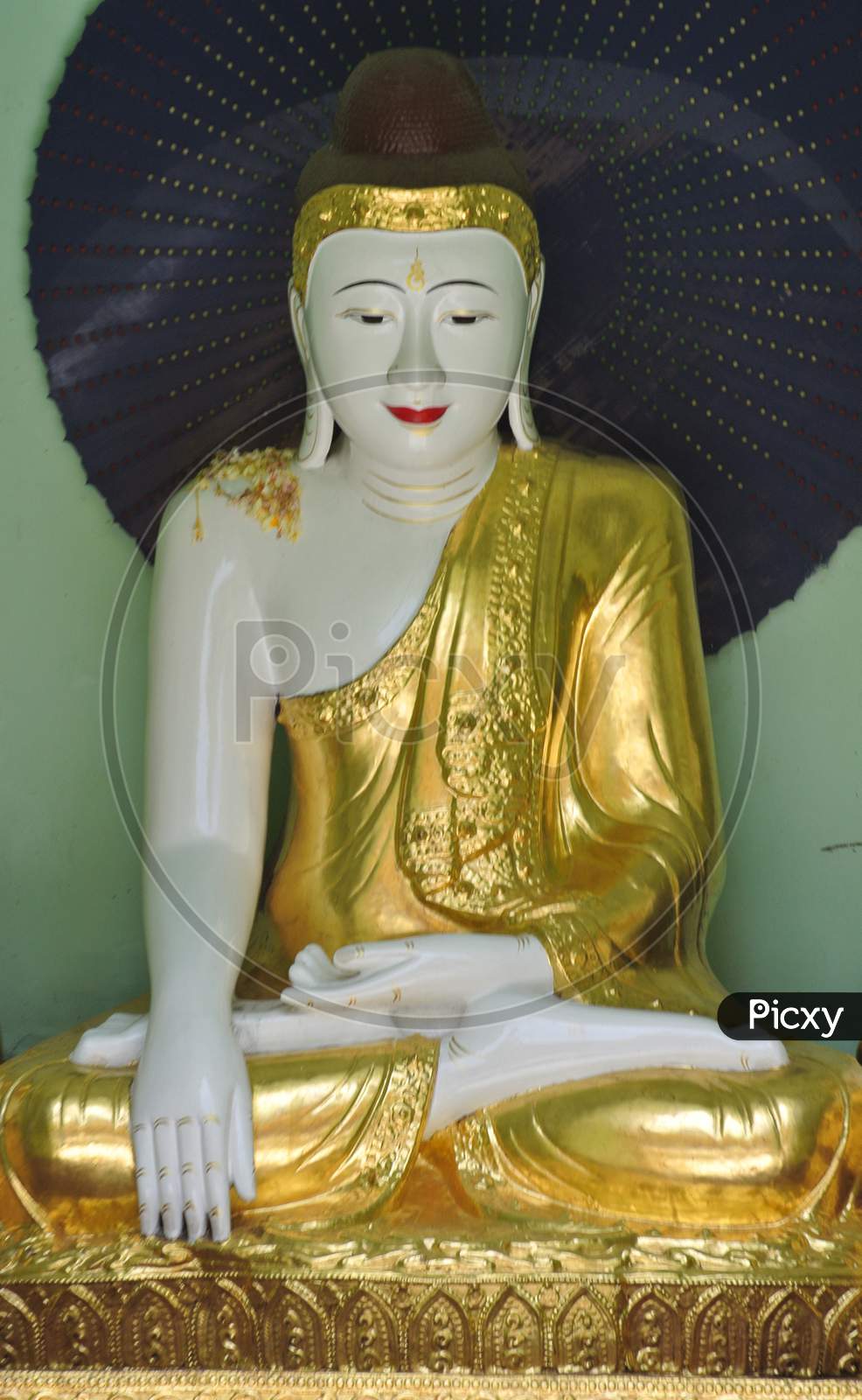 Buddha Statue Holding Parasol