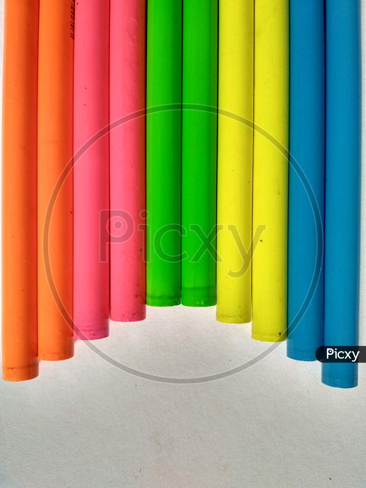 Unsharpened pencils in semi circle