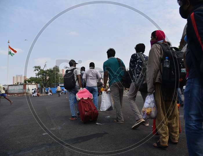 Migrants and Stranded people wait outside Secunderabad Railway Station to board trains as Indian Railways resumes transport services as government eases restrictions for the ongoing nationwide lockdown amid coronavirus pandemic. June 1, 2020, Hyderabad.