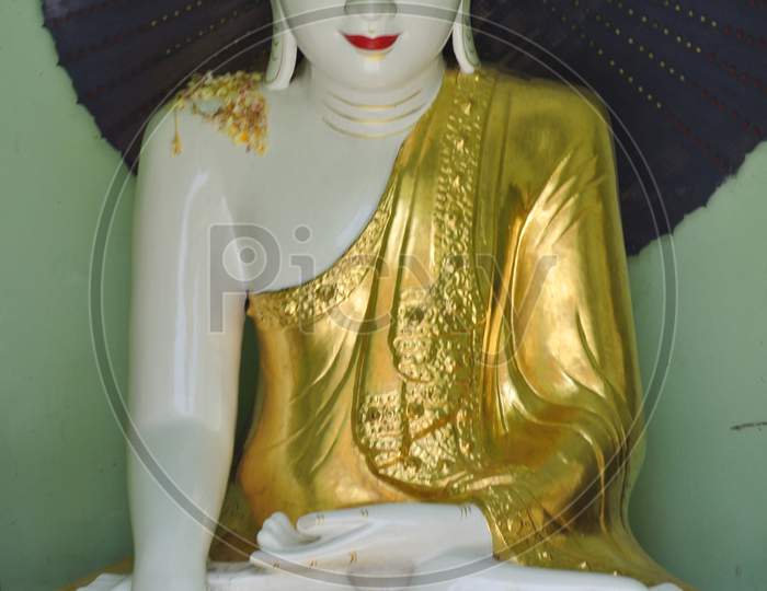 Buddha Statue Holding Parasol