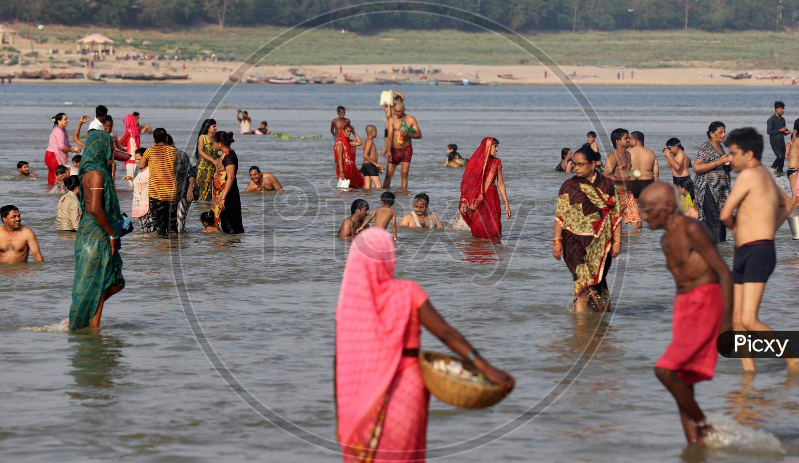 Hindu Devotees Taking Holy Dip in Triveni Sangam Of Three Rivers, The Ganga, The Yamuna And Mythical Saraswati On The Occasion Of Ganga Dusshera Festival In Prayagraj, June 1, 2020.