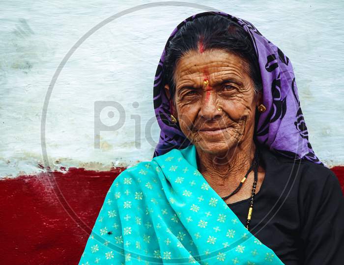 New Delhi, Delhi/ India- May 31 2020:A Portrait Of An Old Lady Wearing Shawl, Smiling And Looking Into The Camera.