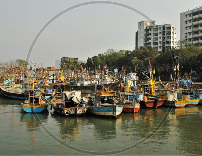 Boats are seen lined up at the deserted Sassoon Docks(Fish market) after the extension of the 21- day nationwide lockdown to limit the spreading of coronavirus disease (COVID-19) in Mumbai, India, on April 15, 2020.