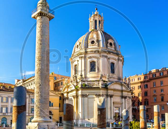 Trajan'S Column And Santissimo Nome Di Maria Al Foro Traiano Church In Rome