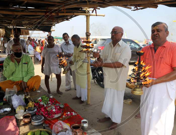 Hindu Devotees Offer Prayers After Taking  Holy Dip In The Ganga River During Nationwide Lockdown 5.0 for Coronavirus or COVID-19 Pandemic  In Prayagraj, June 10, 2020.