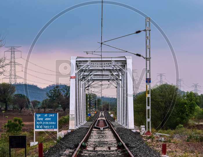 The iron pole bridge for Indian railways with electric polls