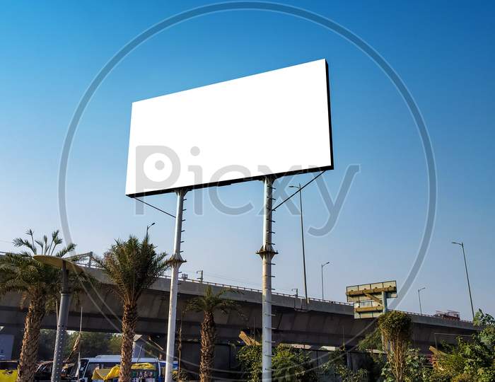 Blank Billboard At Roadside Good Viewership Against Clear Sky
