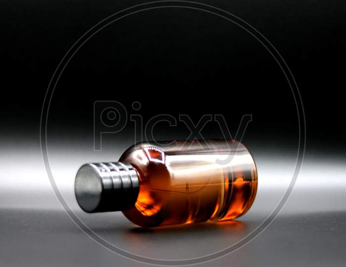 Perfume Bottle With Black Background