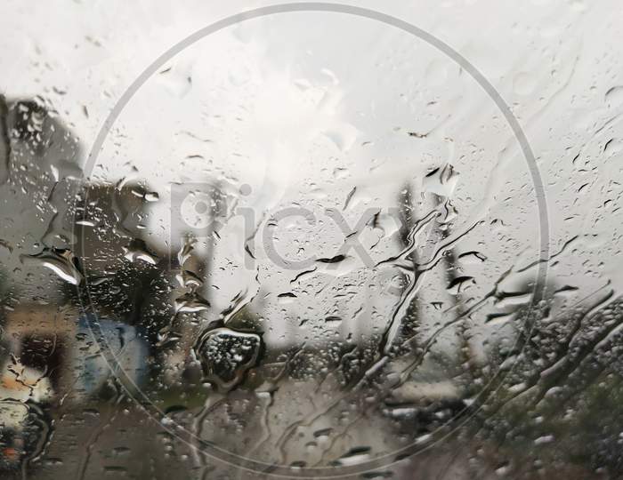 Raining on glass