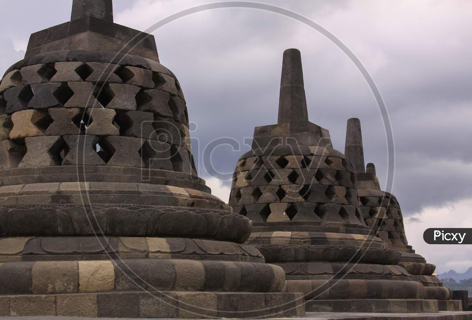 Stupas And Clouds At Candi Borobudur, Indonesia