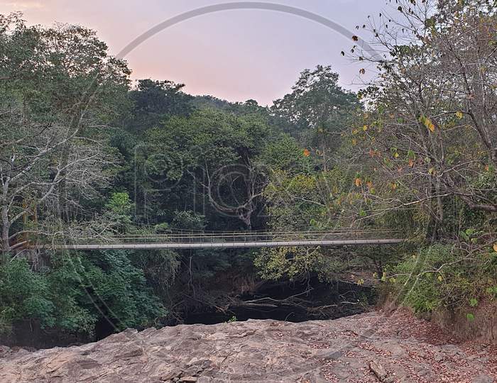 Hanging Bridge at Vazhani Dam Reservoir In Kerala, India.