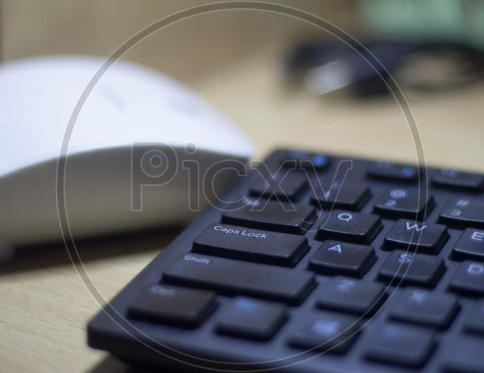 Computer Keyboard Closeup In Black Backlight