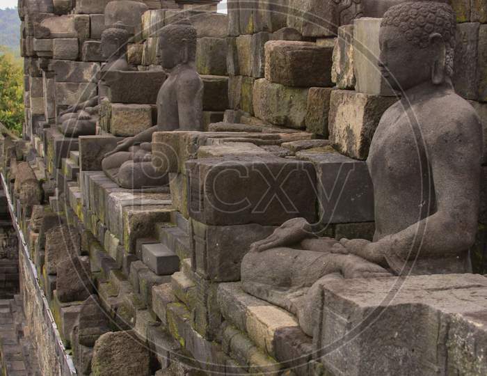 Buddha Statues On Building Side Walls At Borobudur