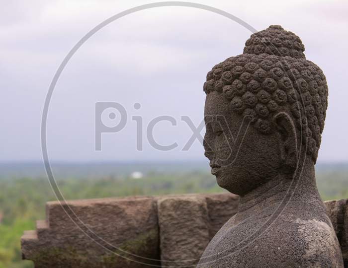 Side Buddha Meditation In Stupa At Borobudur, Java