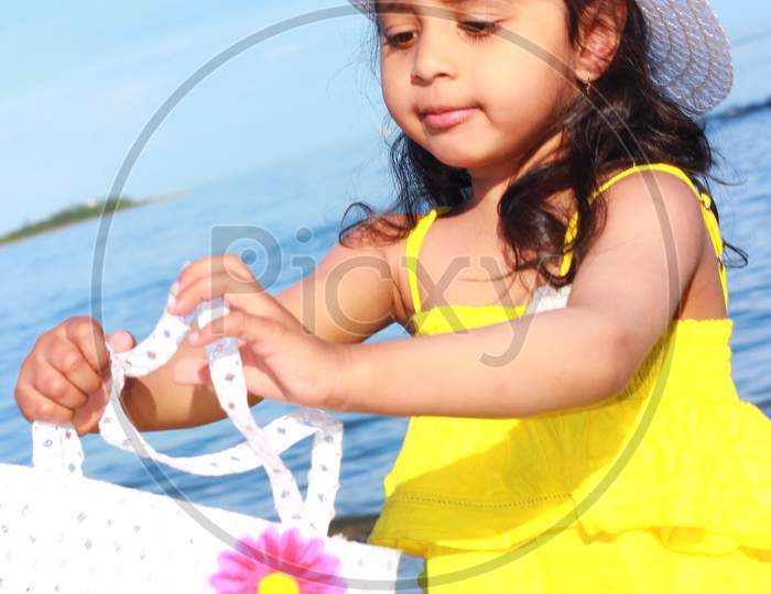 Girl having fun in the beach in summer.