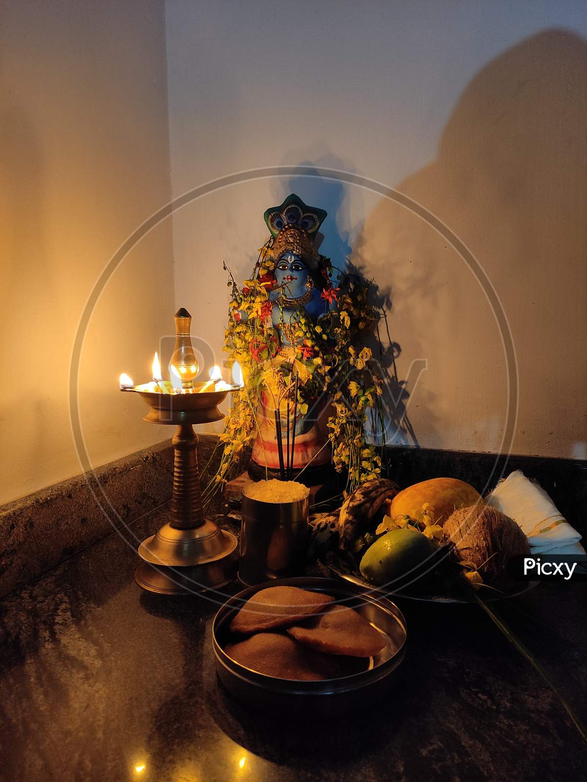 A traditional Vishu kani setting with auspicious items