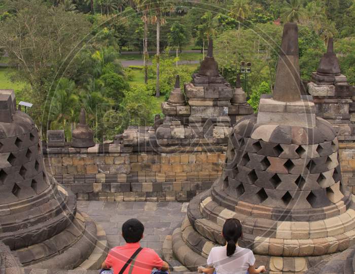 Couple Meditation At Borobudur Buddhist Temple