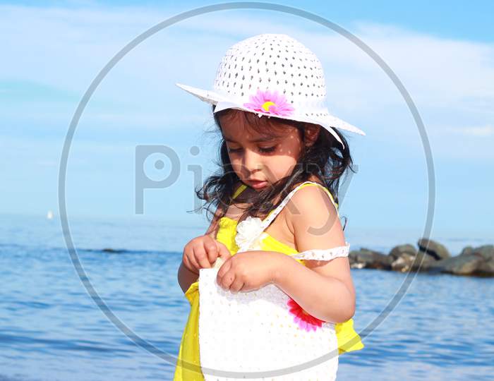 Girl having fun in the beach in summer.
