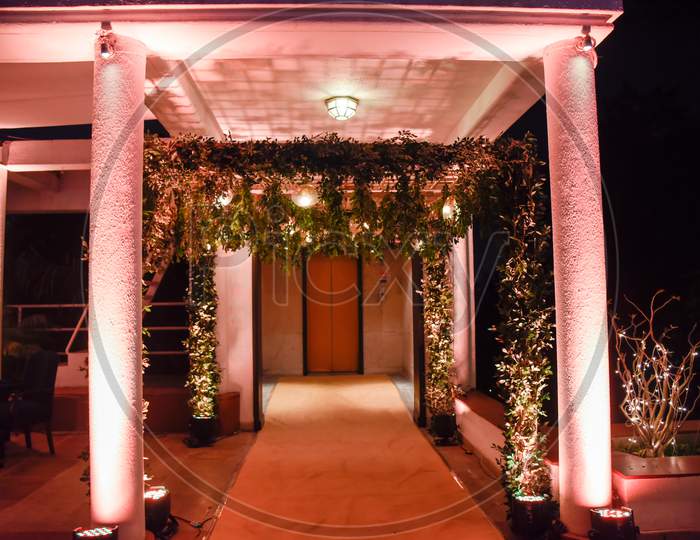 Wedding. Wedding ceremony. Arch. Arch, decorated with pink and white flowers standing in the woods, in the wedding ceremony area