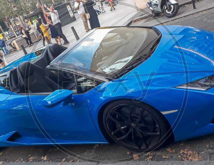 Paris, Frence- July 4 2018: Blue Luxus Car On City Street