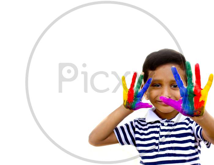 Portrait of a Kid with paint on the palm