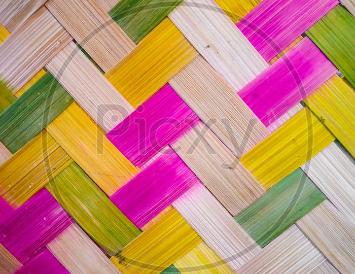 bamboo wall and bamboo mat texture background wallpaper , yellow ,green , brown and pink color bamboo texture background.