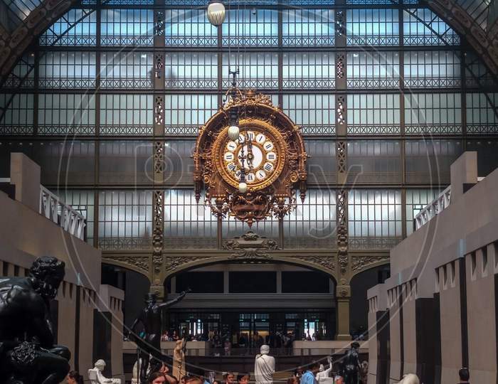 Paris, France- July 2018: Old Station Orsay Museum Golden Retro Clock