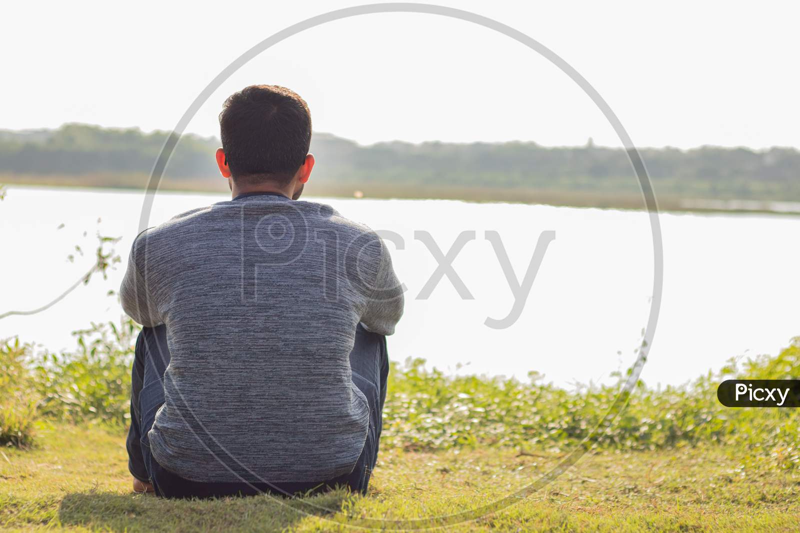 Image Of A Lonely Man Sitting In Front Of The Lake In Sunny Day Concept Of Loneliness Break Up Single And Alone Hw Picxy