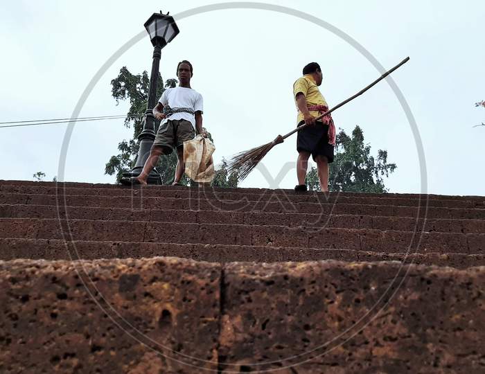 Frontline worker, the sweepers are ready to swipe the road and ghat of Bindu Sagar