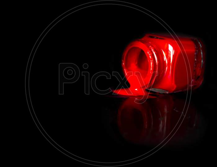 Selective Focus on Red Colour Paint with Black Background