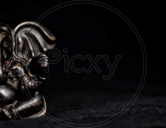 miniature photography of lord ganesh