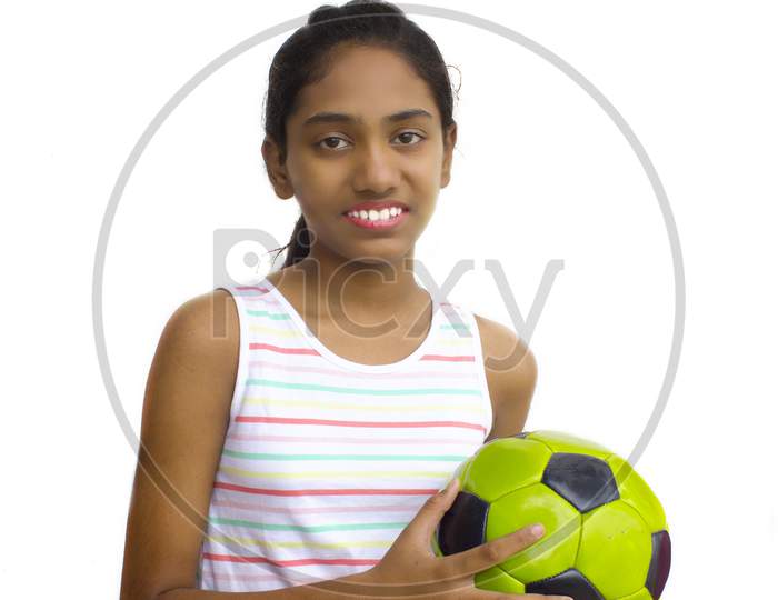 Portrait of a Young Indian School Girl Holding a Ball