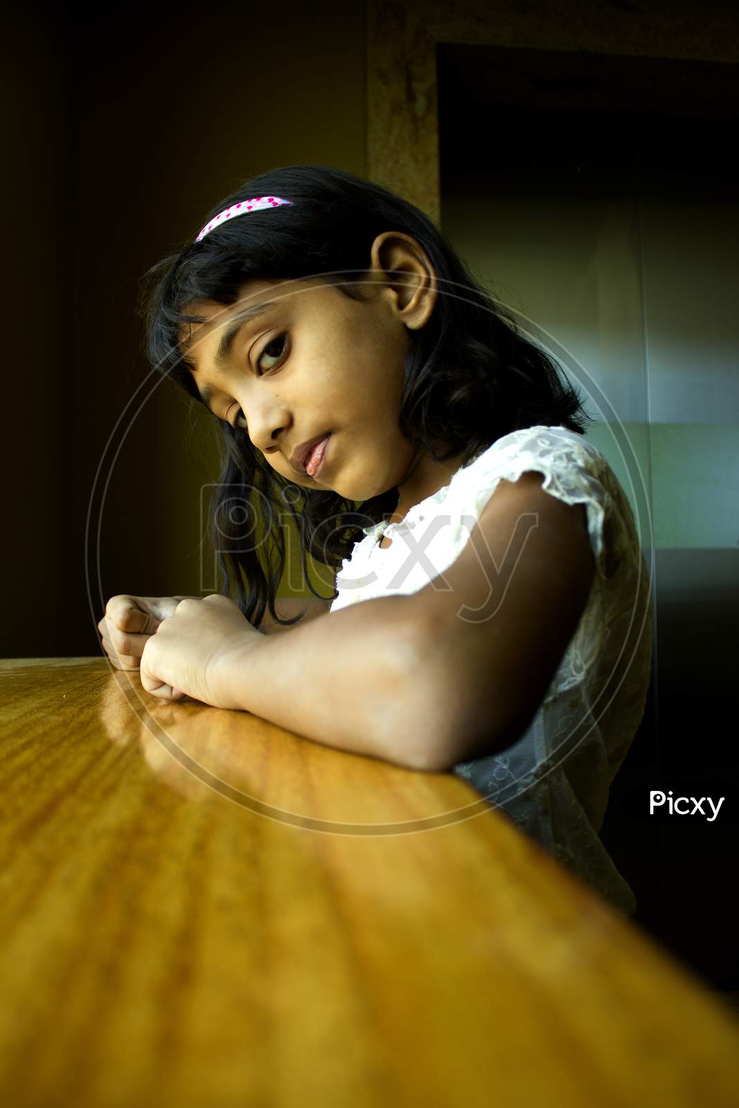 Portrait of a Young Indian Girl with Sad Face