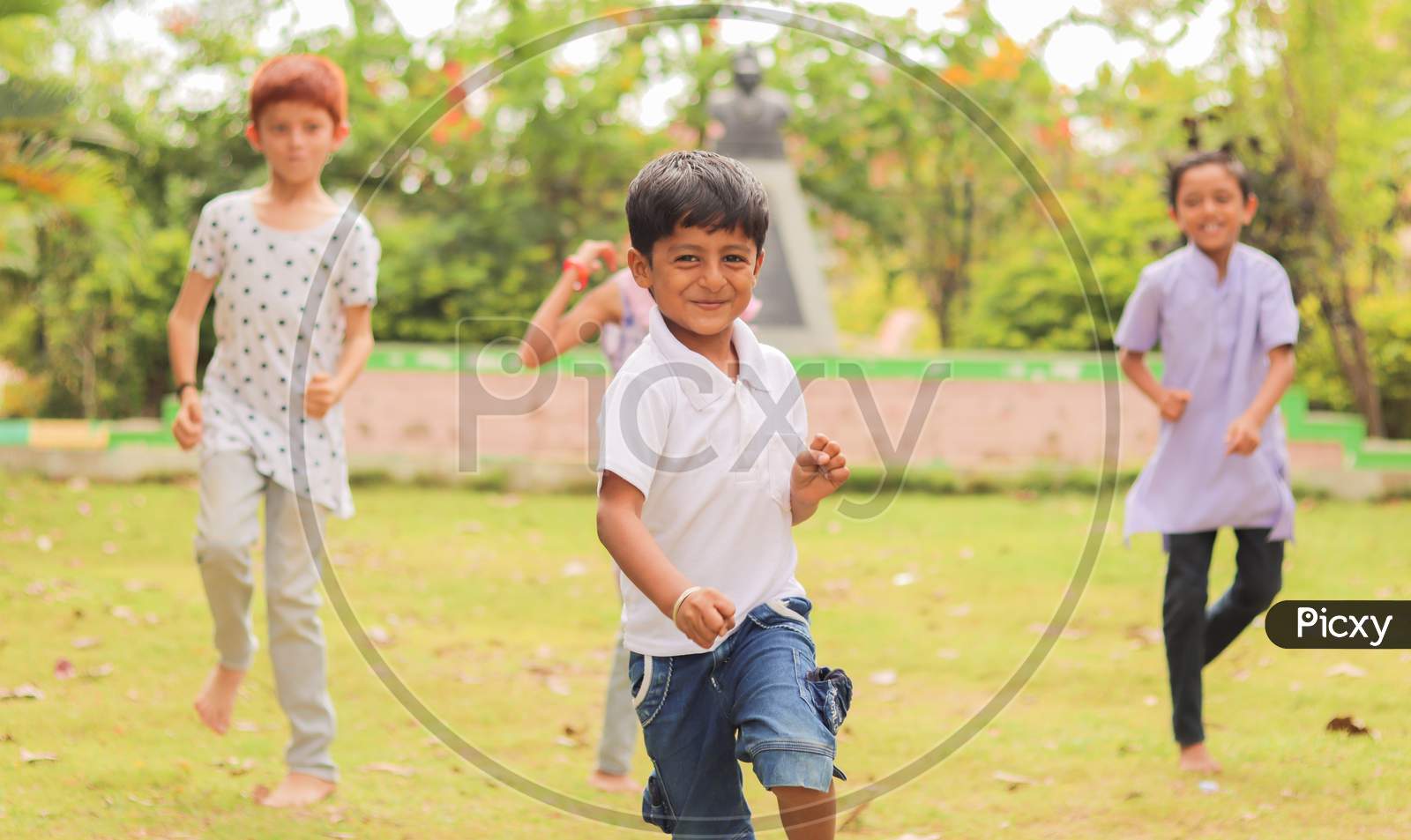 Children Playing Outdoor Games - Concept Of Kids Enjoying Outdoor Games In Technology-Driven World.