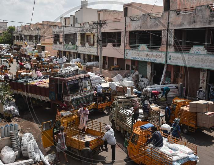 A view of a busy Mahatma Gandhi wholesale commercial market after authorities eased restrictions, during the fifth phase of coronavirus lockdown in Vijayawada.