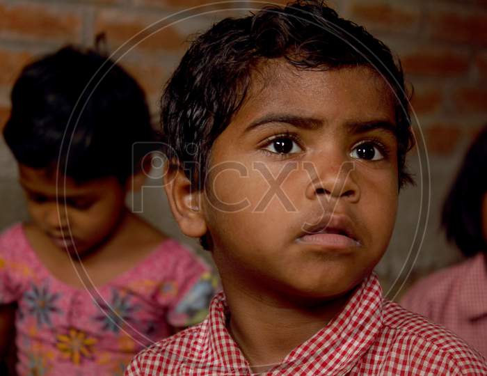 Portrait of a Rural Kid in School Dress