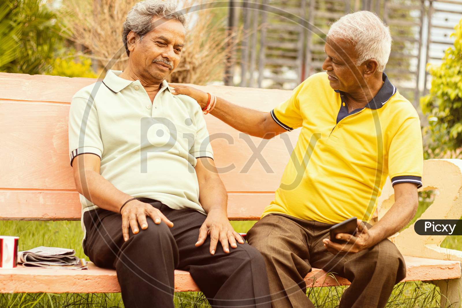A couple of Old or Elderly Men's Talking to Each Other
